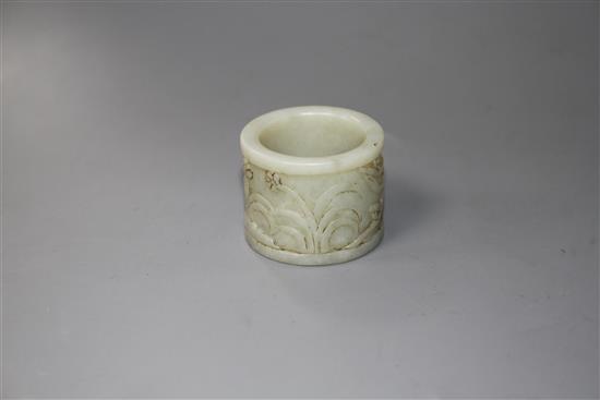 A Chinese pale celadon jade archers ring, 17th/18th century,